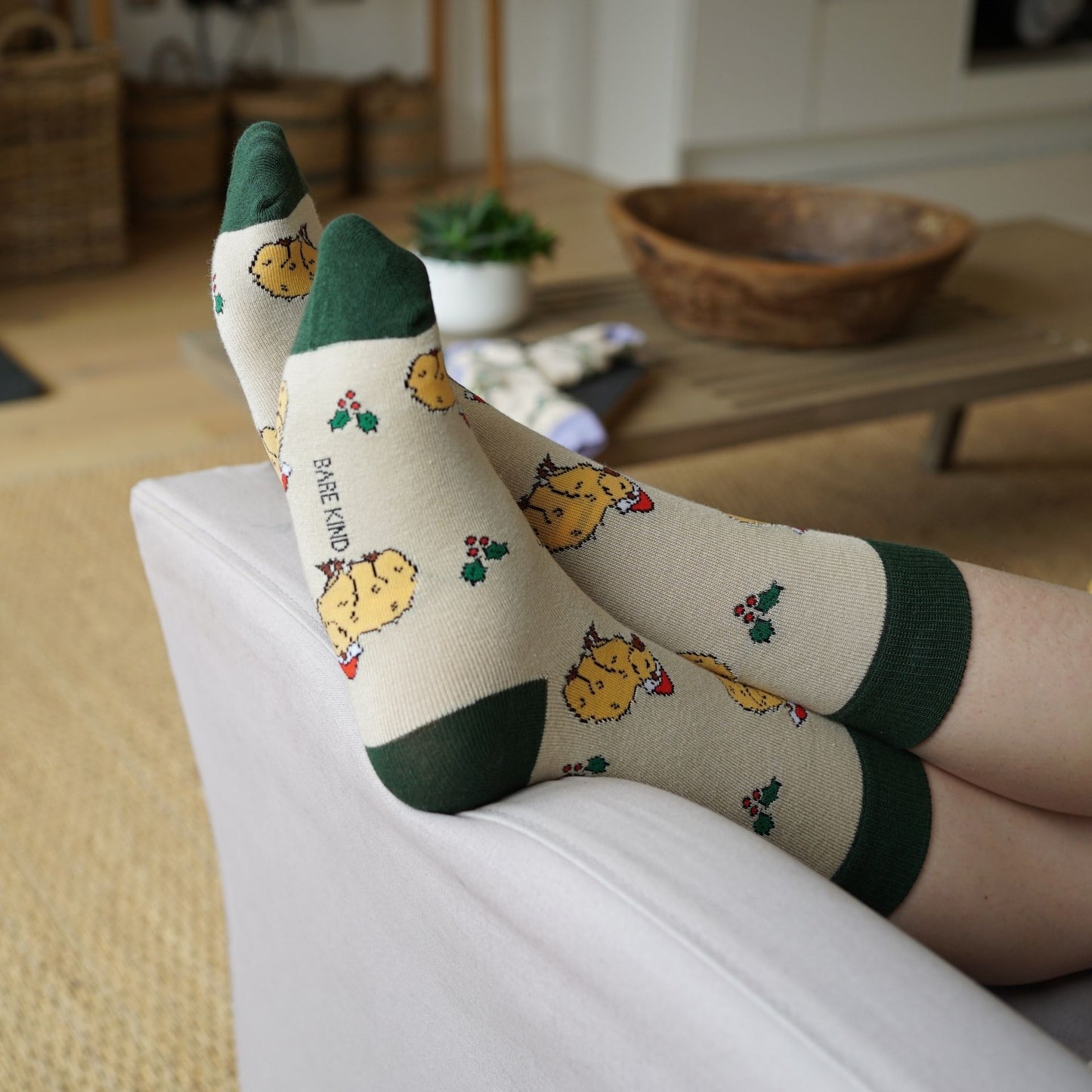 Pair of capybara socks on a white surface