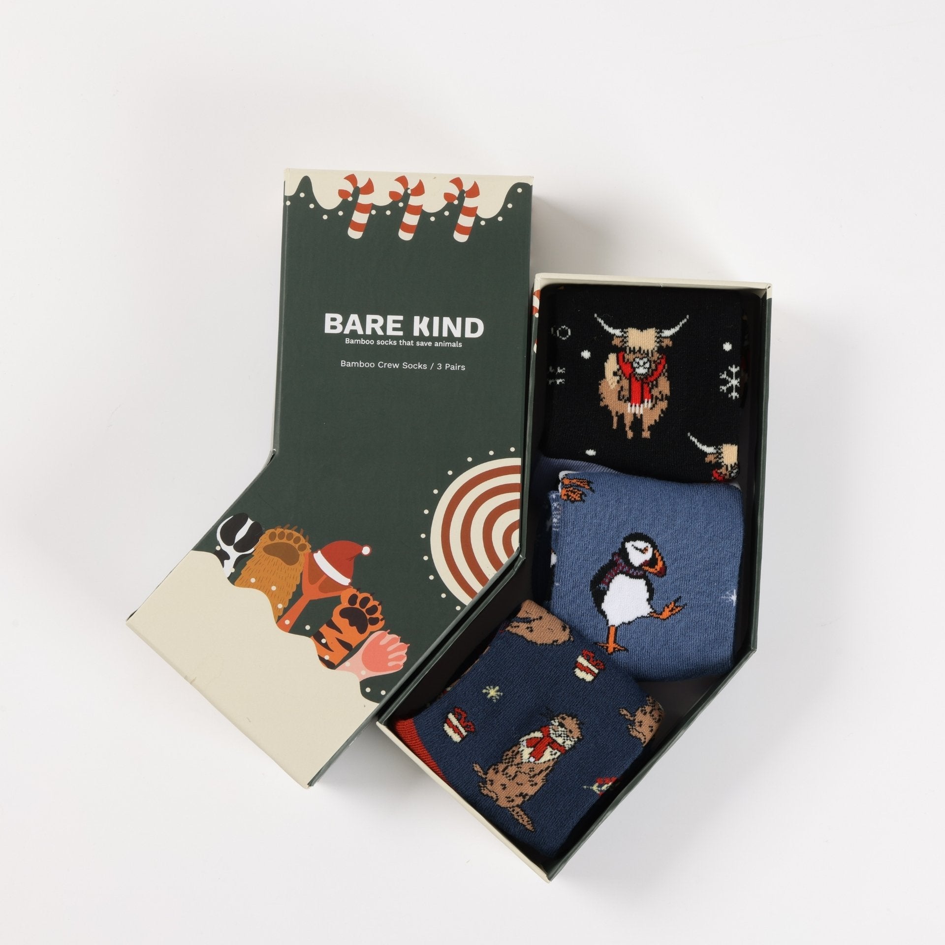 Box of Bare Kind socks with animal-themed designs on a white background