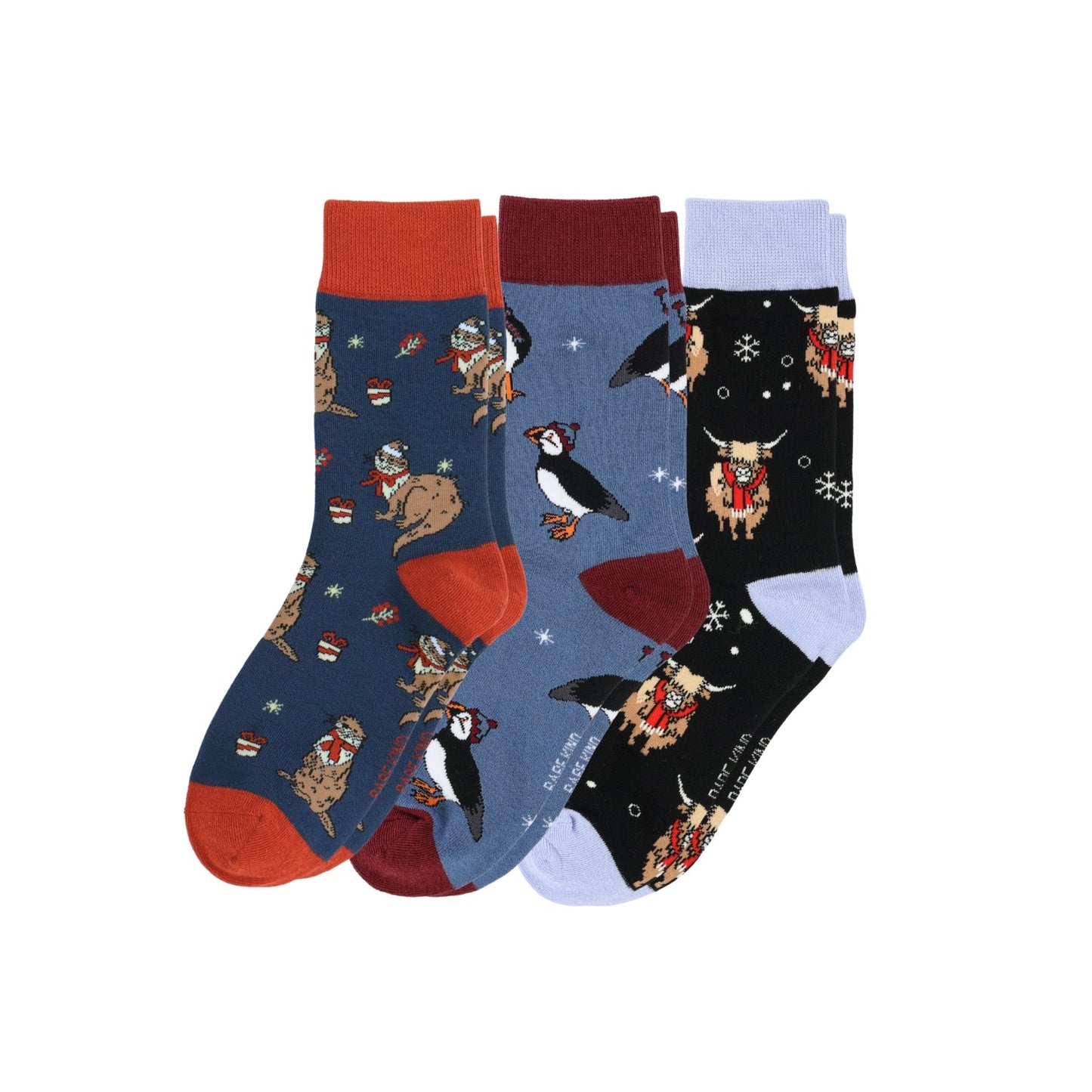 Three pairs of socks with animal patterns on a white background