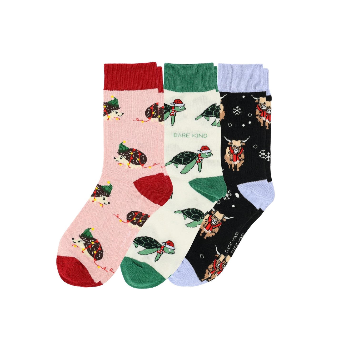 Set of three socks with animal patterns on a white background
