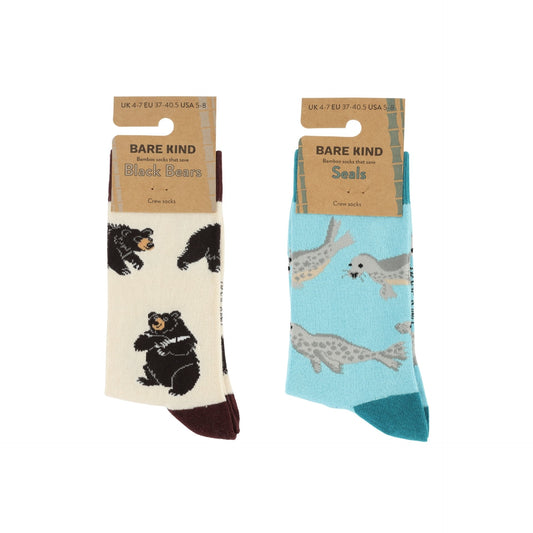 Two pairs of socks with animal illustrations on a white background, each in packaging with 'Bare Kind' branding.