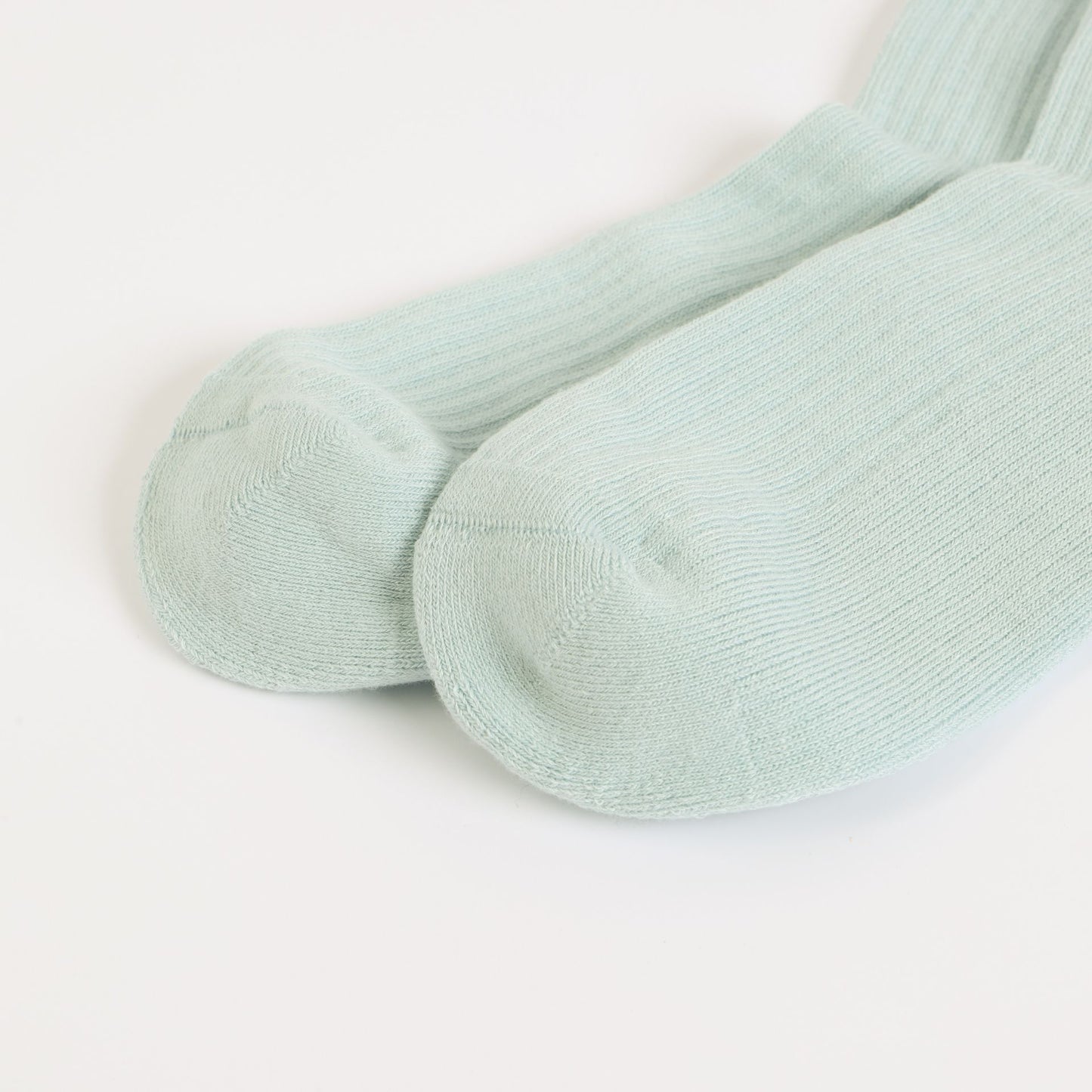 flat lays of blue puffin ribbed bamboo socks