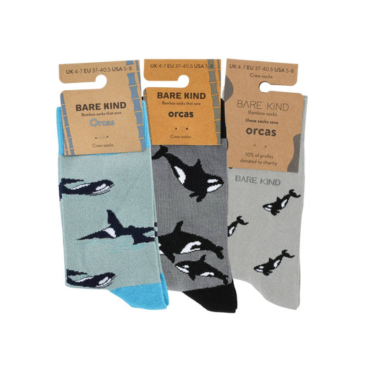 Three pairs of socks with orca whale design packaging, labeled 'Bare Kind'.