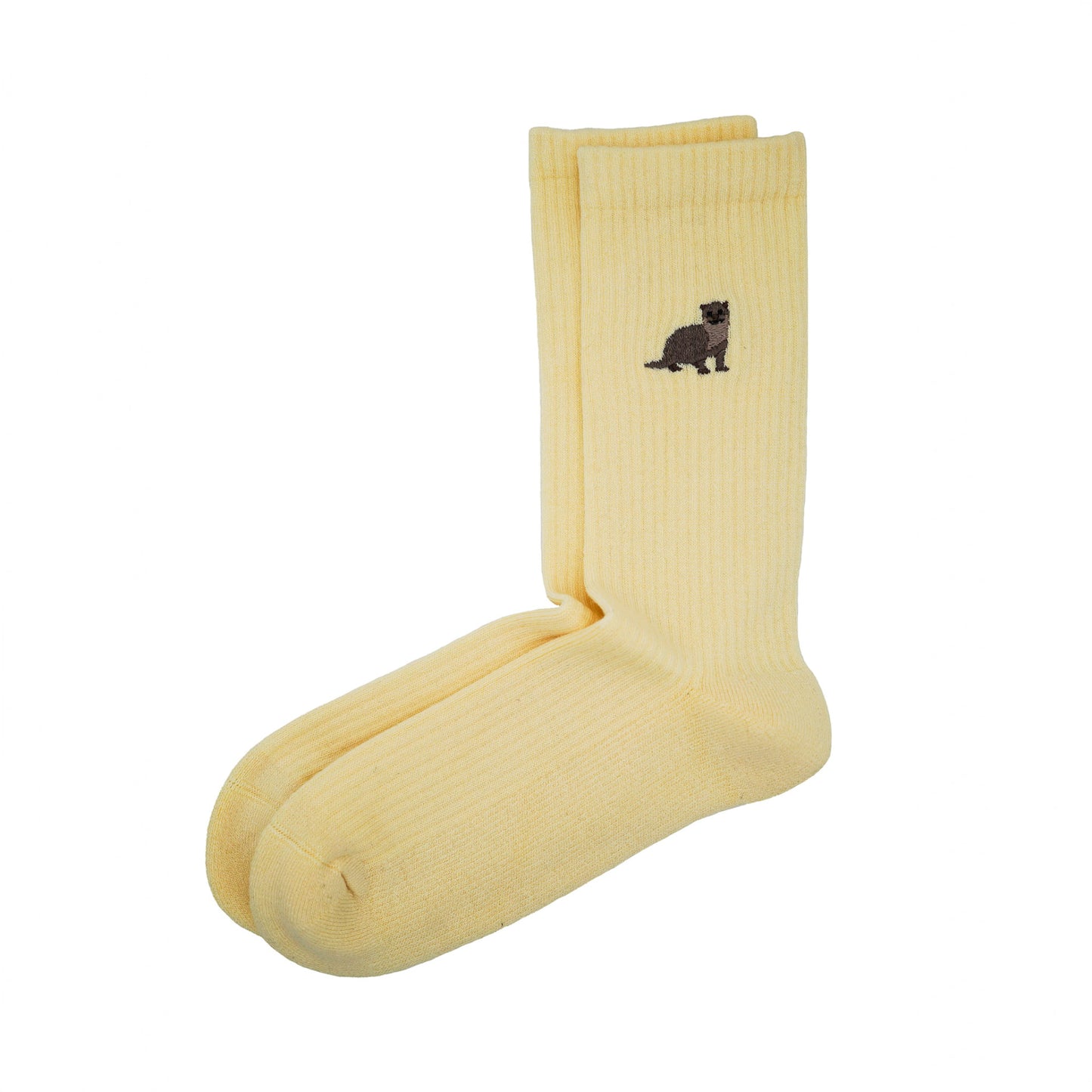 flat lay image of yellow ribbed bamboo socks with a otter motif