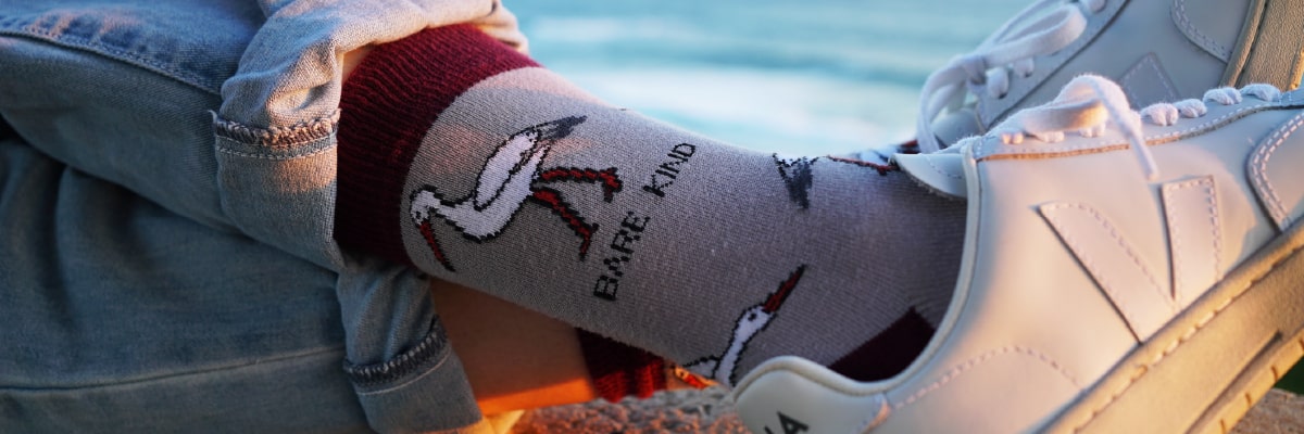 model wearing pink stork bamboo socks