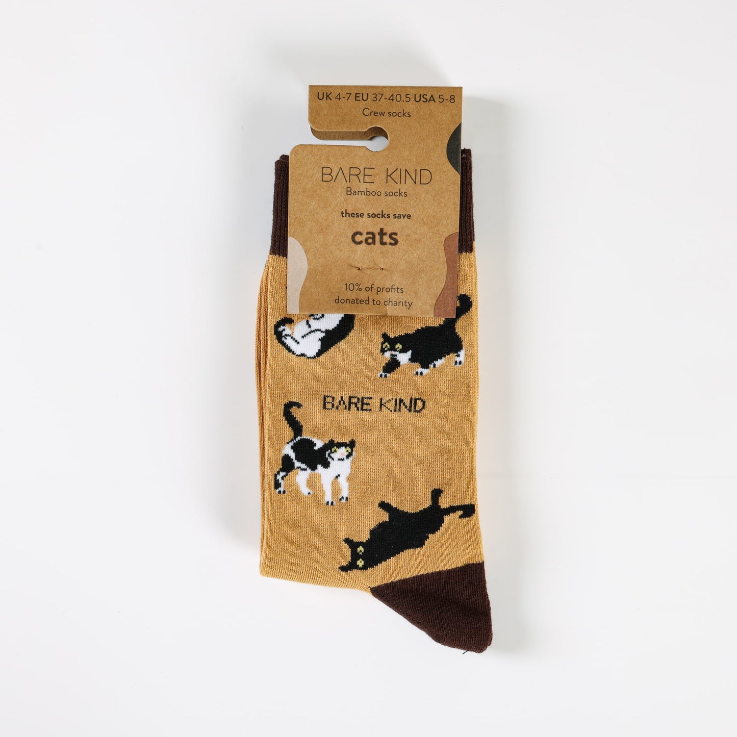 packaging flat lay of yellow brown cat bamboo socks