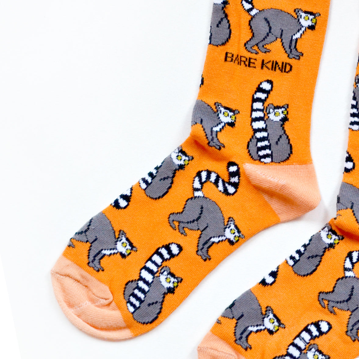 toe closeup flat lat of orange lemur bamboo socks