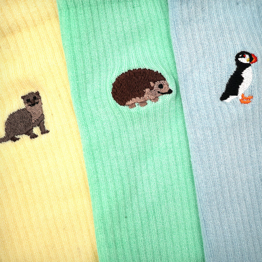 Flat lays of ribbed socks featuring animal design 
