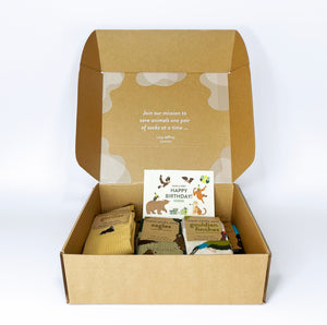February's Birthday Gift Box featuring 7 beautiful bamboo socks that save animals