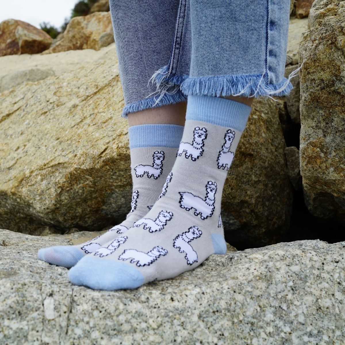 model wearing grey blue alpaca bamboo socks