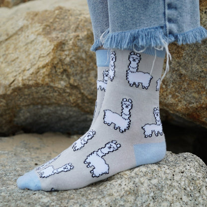 model wearing grey blue alpaca bamboo socks