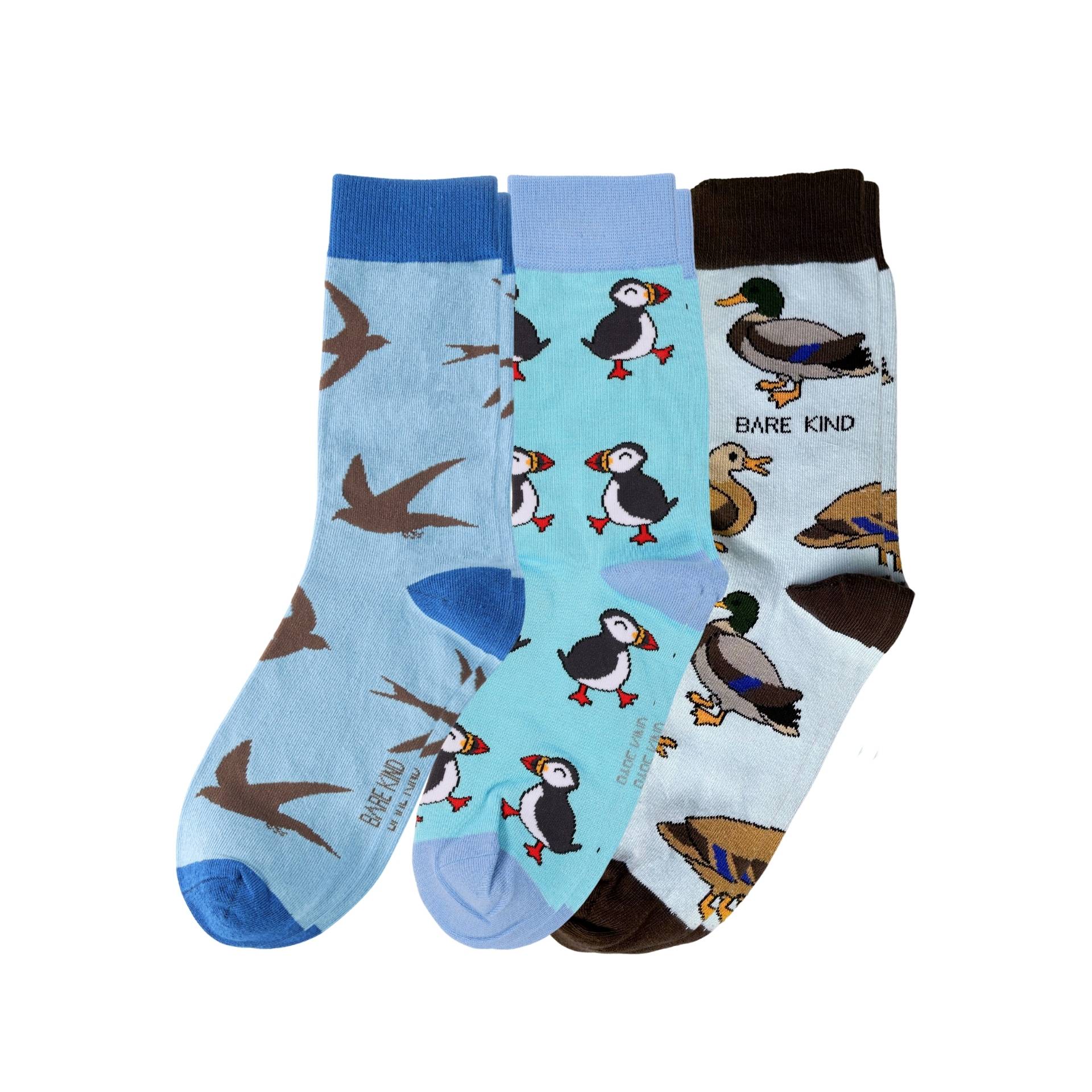 Three pairs of socks with animal patterns on a white background
