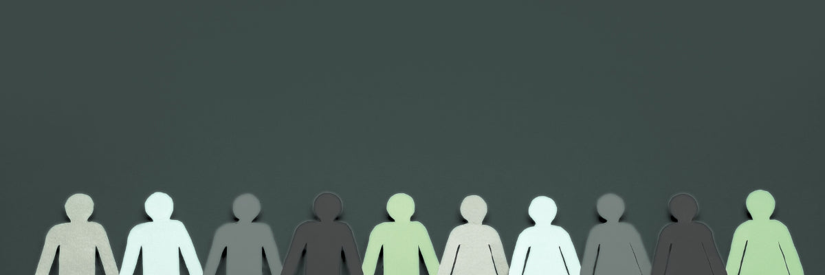 Row of stylized human figures with glowing green center on a dark background