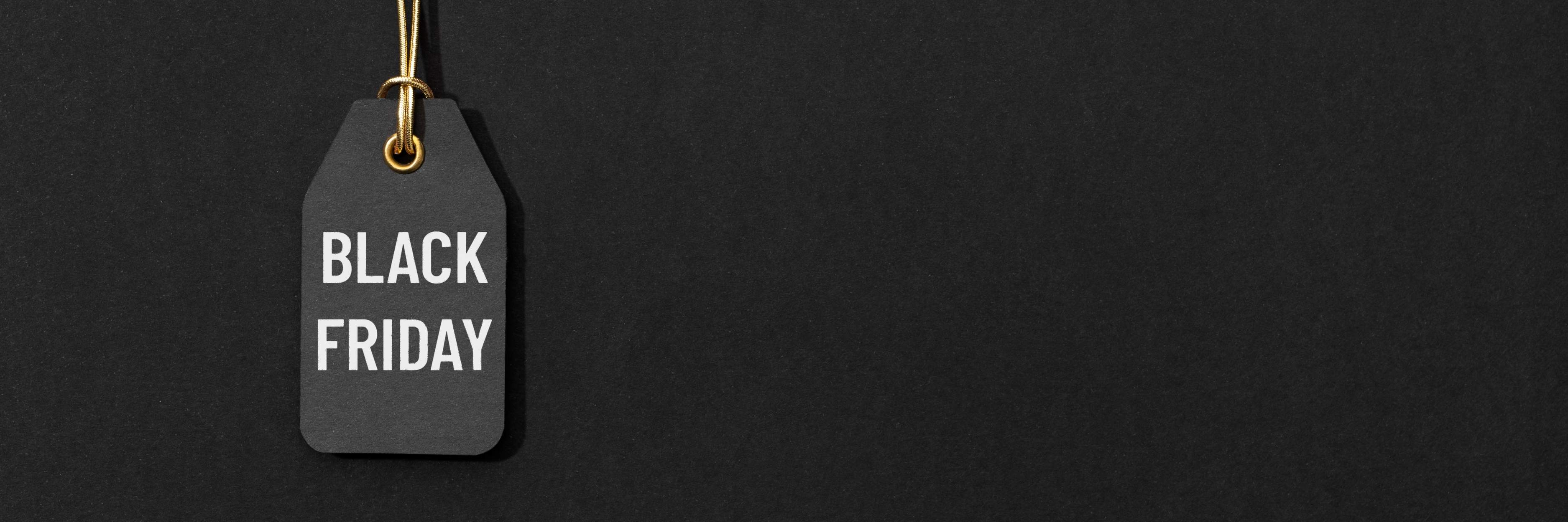 Black Friday tag hanging on a black background