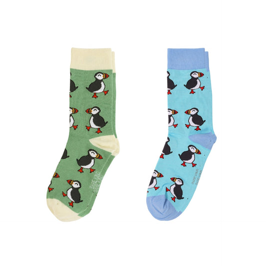 Two socks with puffin design, one green and one blue, on a white background.