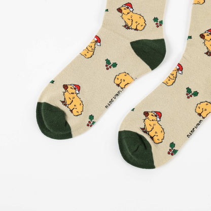 capybara socks with green accents on a white background