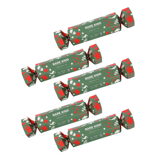 Green and red christmas crackers on a white background