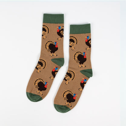 Pair of socks with turkey pattern on a white background