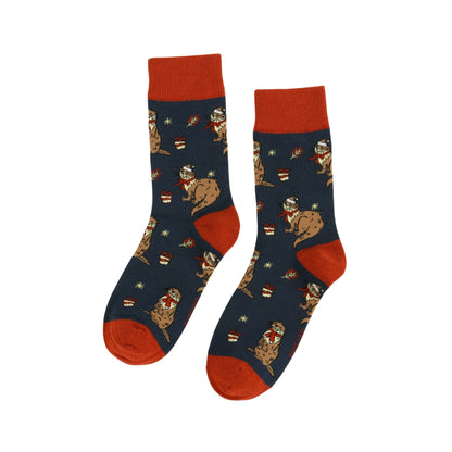 Pair of Christmas Otter socks on a white background
