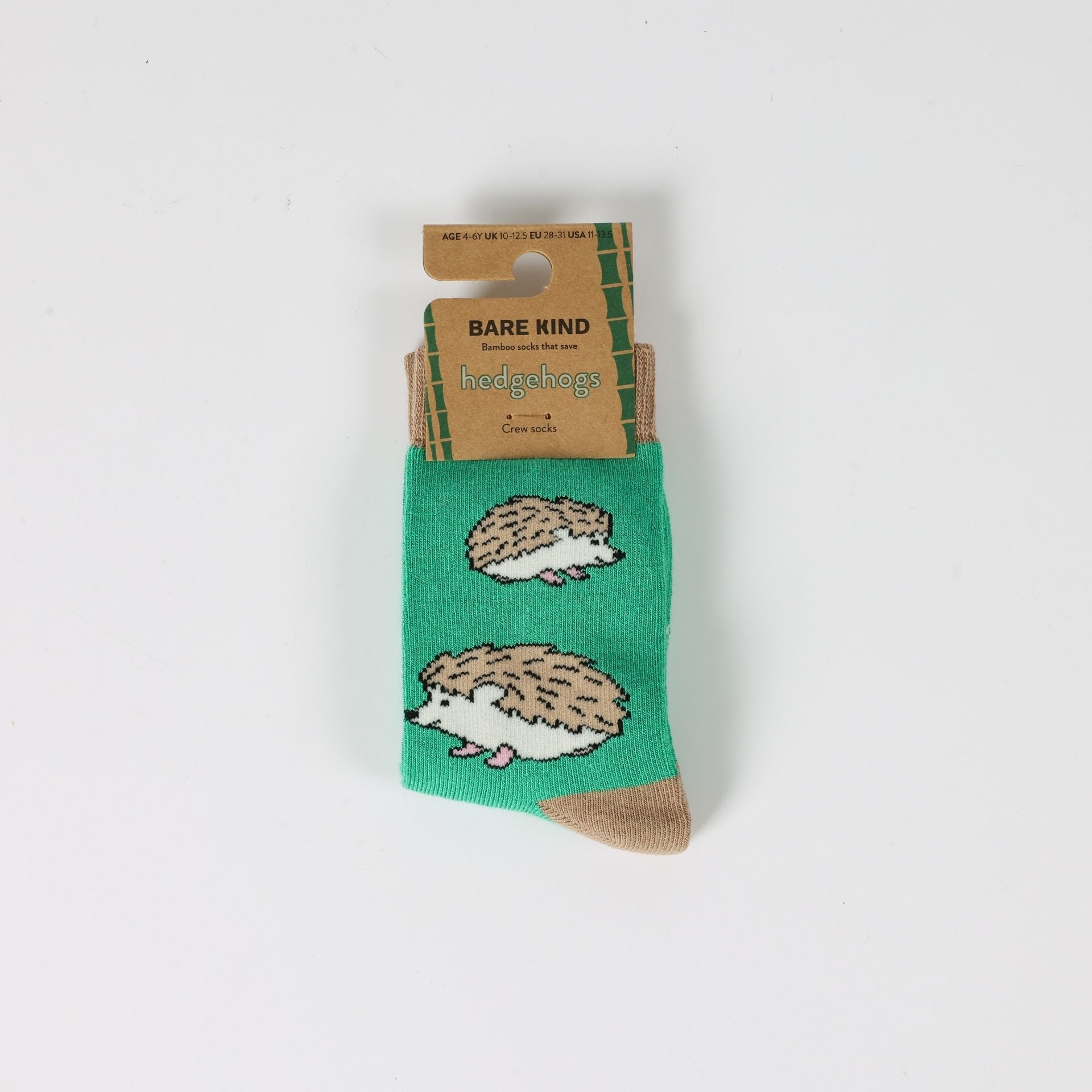 Green socks with hedgehog design on a white background