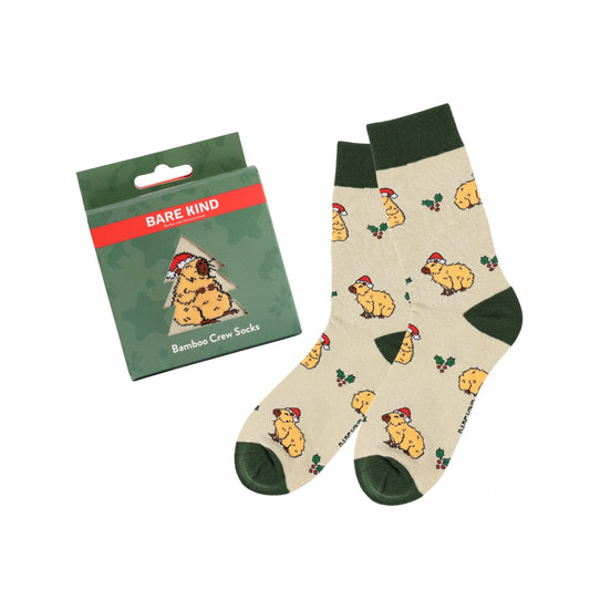 Christmas Capybara socks with packaging on a white background