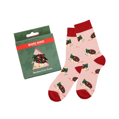 Christmas Hedgehog socks with packaging on a white background