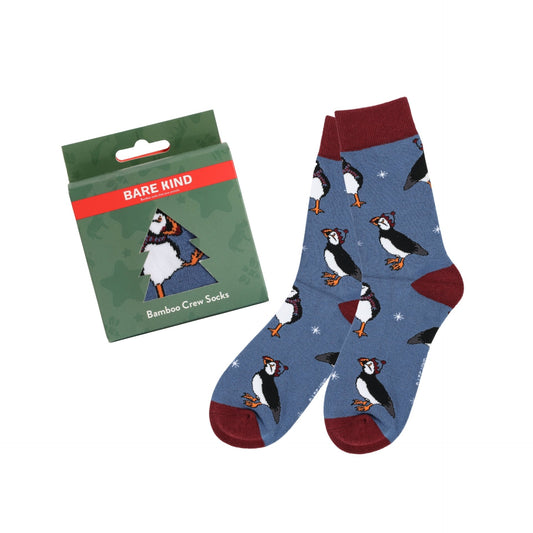 Blue Christmas Puffins socks with packaging on a white background