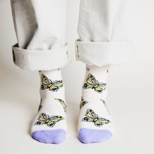 front view of standing model wearing butterfly bamboo socks