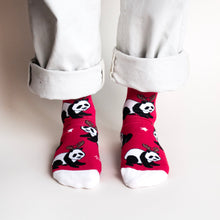 model wearing christmas panda socks