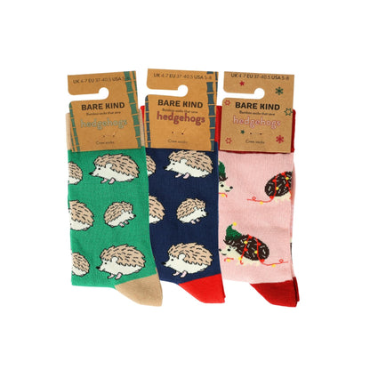 Three pairs of socks with hedgehog design packaging labeled 'Bare Kind'.
