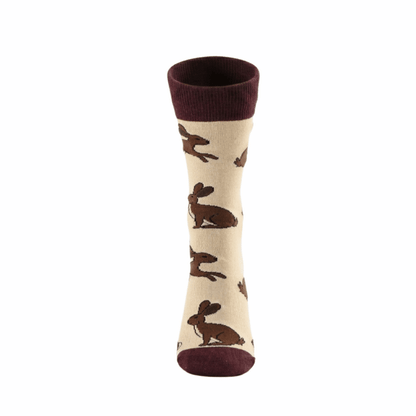 Beige socks with brown hare illustrations 