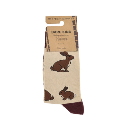 Beige sock with brown hare designs and 'Bare Kind' packaging on a white background