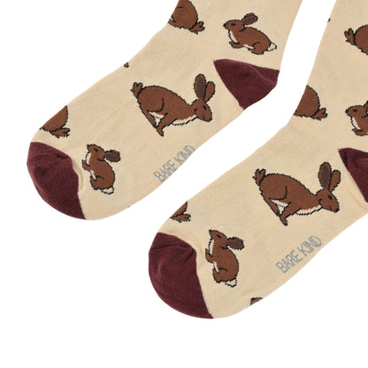 Beige socks with brown hare illustrations 