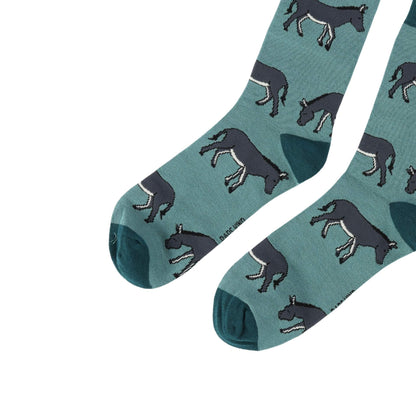 Pair of socks with donkey pattern on a white background