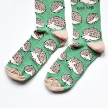 toe closeup flat lay of green bamboo hedgehog socks
