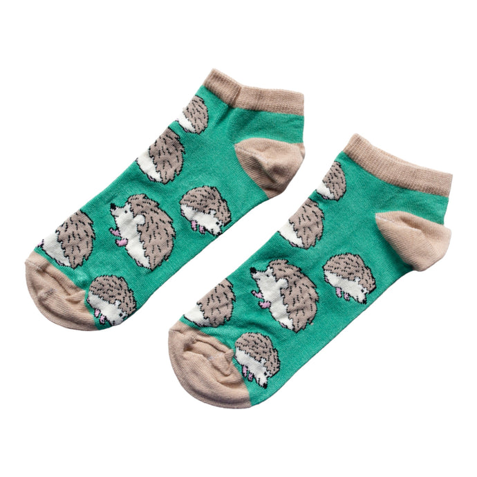 green hedgehog trainer socks flat lay