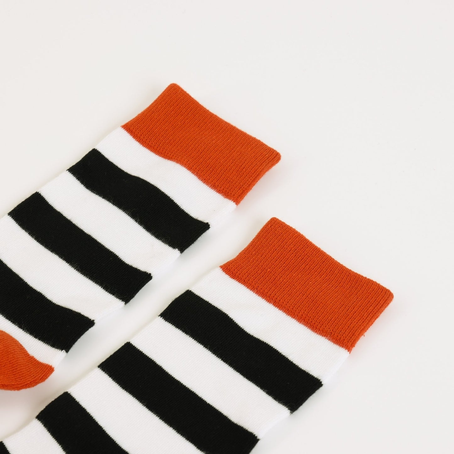 Pair of Hedgehog stripes socks on a white background