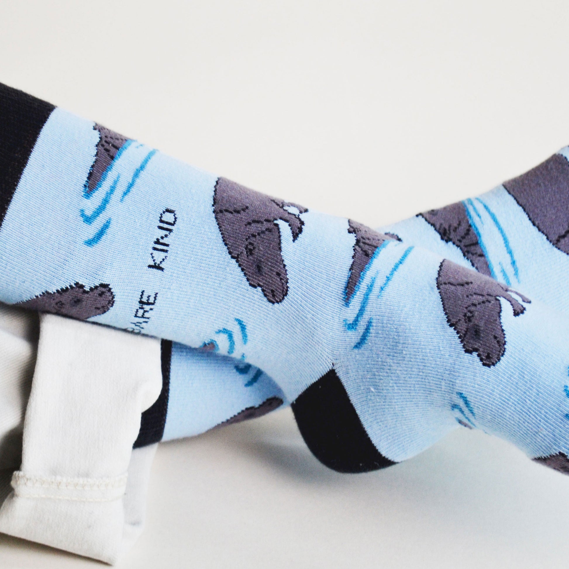 closeup of model wearing bamboo hippo socks, side angle view