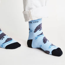 standing model wearing blue hippo socks made with bamboo fibre