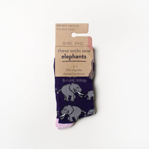 folded flat lay of purple and pink elephant bamboo socks for kids in 100% recyclable cardboard packaging