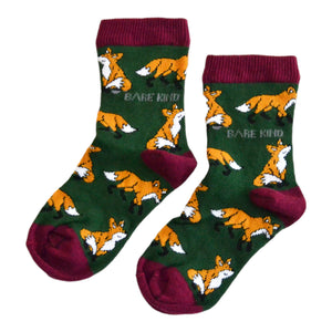 flat lay of dark green fox socks for kids