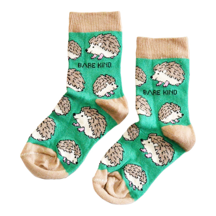 flat lay of green hedgehog socks for kids