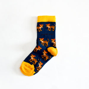 single flat lay of blue leopard socks for kids