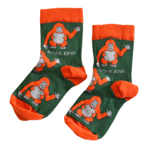 flat lay of dark green bamboo orangutan socks for kids