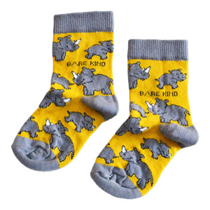 flat lay of mustard rhino socks for kids