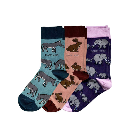 Set of three pairs of socks with animal designs on a white background