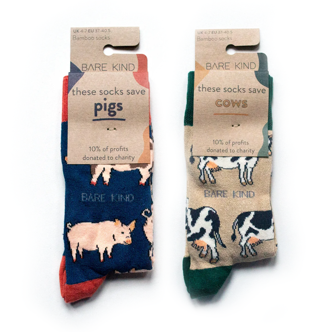 Flat lay of Bare Kind Stuck in the Mud 2 pack set of pigs and cows bamboo socks in 100% recyclable packaging