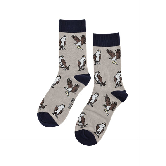 A pair of crew socks with a light gray base featuring a repeating pattern of brown and white ospreys, with dark navy cuffs, heels, and toes.