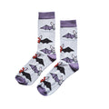 Flat lay of purple and grey bamboo socks with bats woven into the design