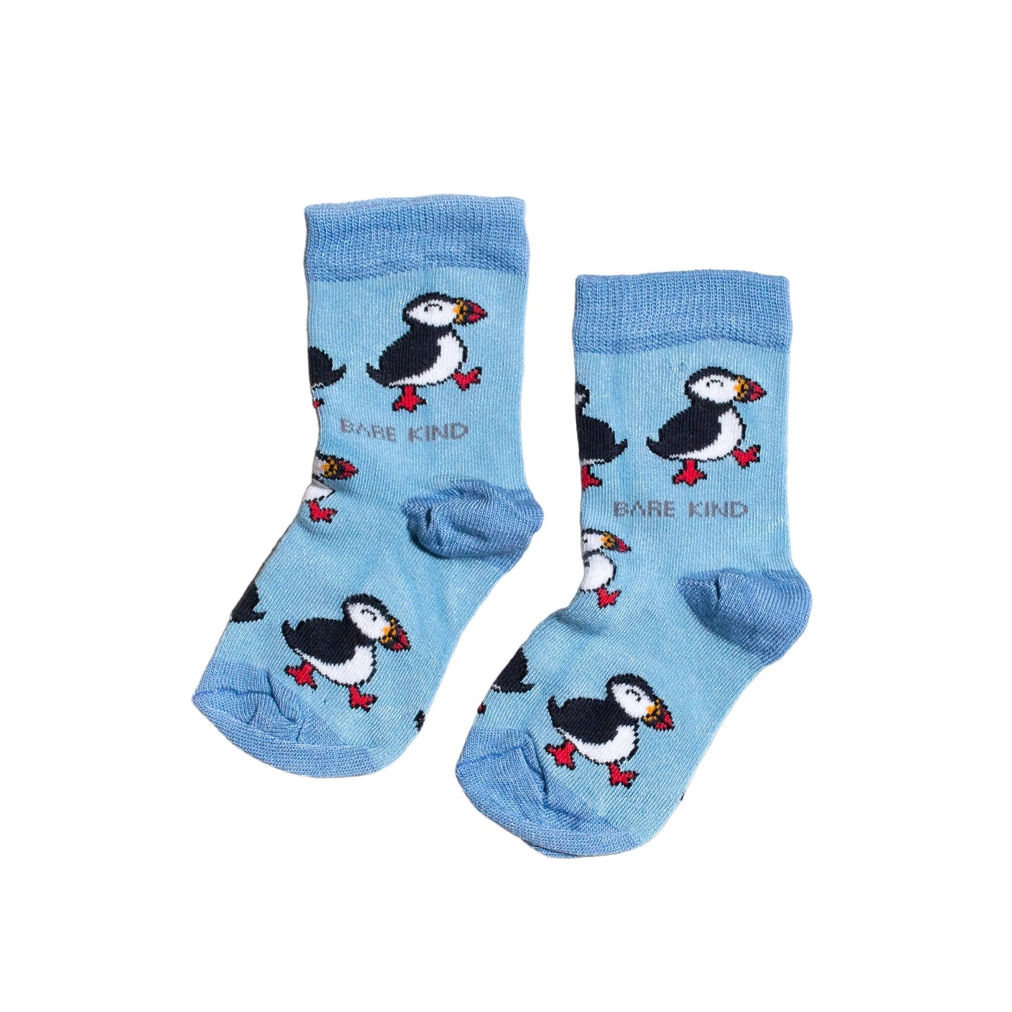 flat lay of blue puffin bamboo socks for kids